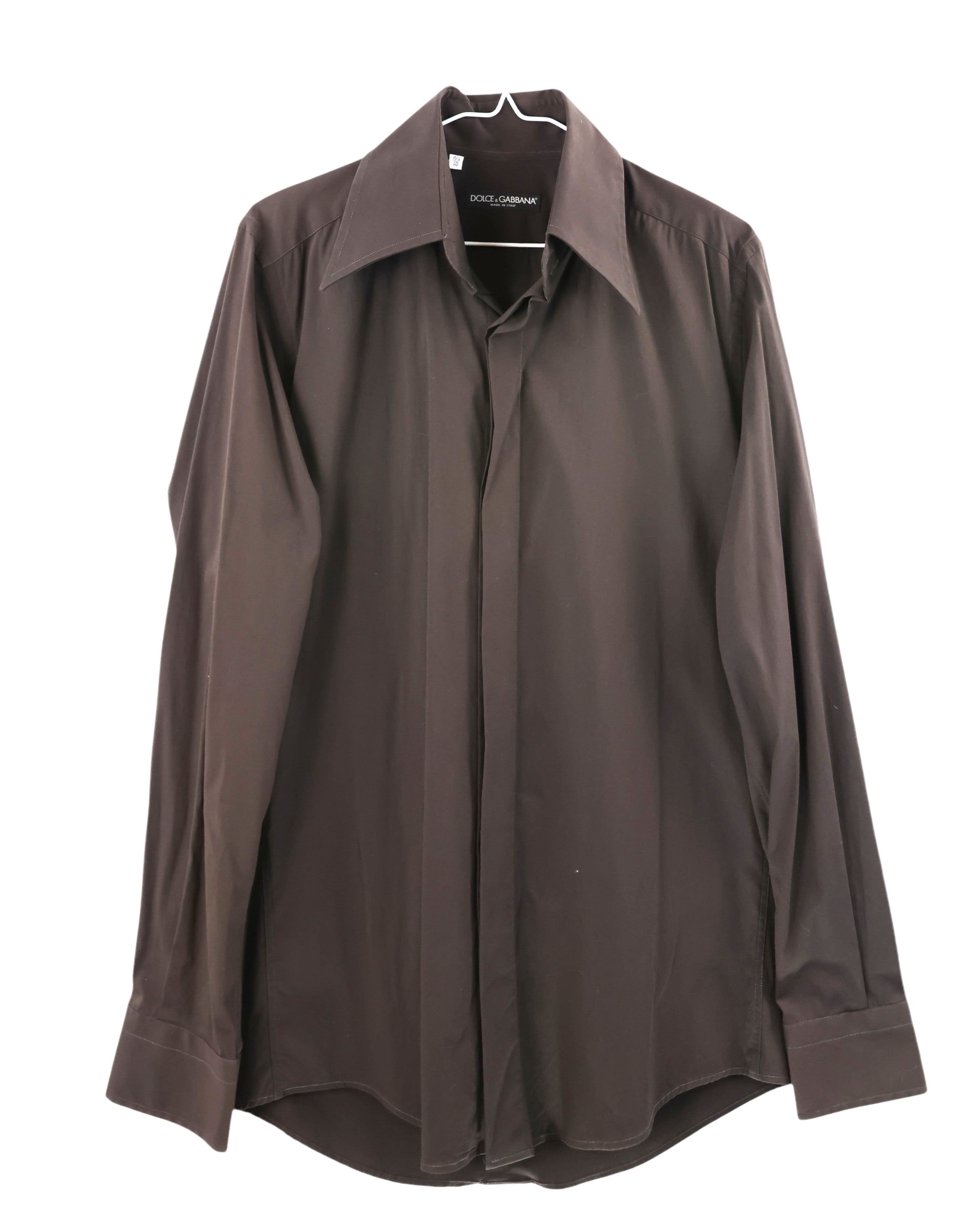 Dolce & Gabbana brown/chocolate/espresso dress shirt, button-up/button-down poplin; long sleeves, sharp oversized point collar, clean concealed placket, curved hem; tailored slim fit, unisex; works with suits, smart-casual, evening looks; minimal/retro-70s/Italian-tailoring vibes; Italian luxury house from Milan; rare vintage piece.