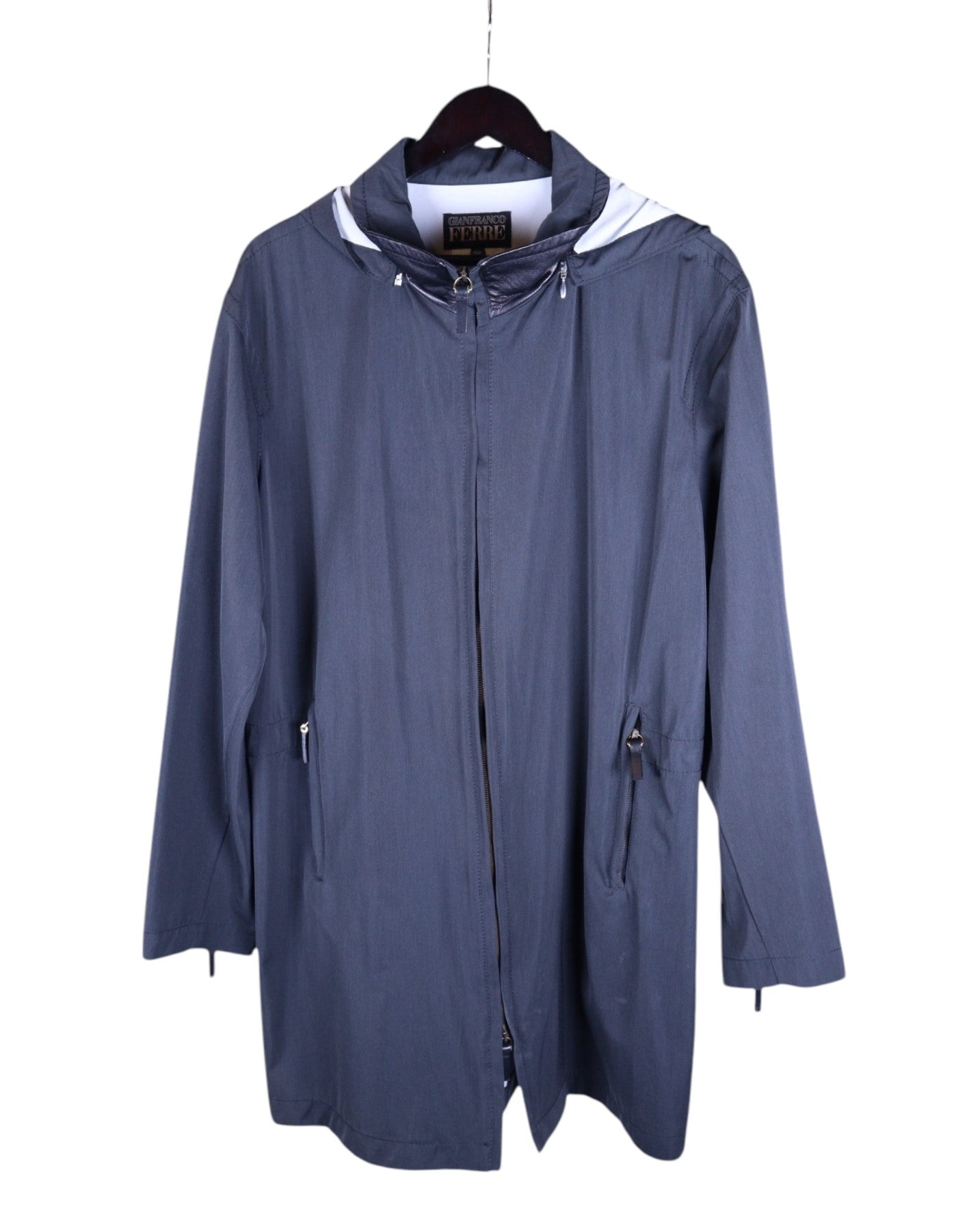 Gianfranco Ferré dark grey/charcoal long leather jacket–coat; hooded parka style with drawstring hood, two-way zip front, zipped hand pockets, longline cut; matte silver hardware; regular fit, unisex; works with denim, tailoring, streetwear; minimalist, urban, techwear, Y2K; brand context: Italian luxury house from Milan, architect-of-fashion heritage; vintage outerwear.