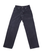 Vintage Gianni Versace Jeans Couture dark charcoal/black denim jeans/jean trousers with a gently faded wash; mid-rise straight-leg, classic five-pocket style with belt loops, button front and clean hems. Heritage luxury, rare and unique piece laid flat on white.