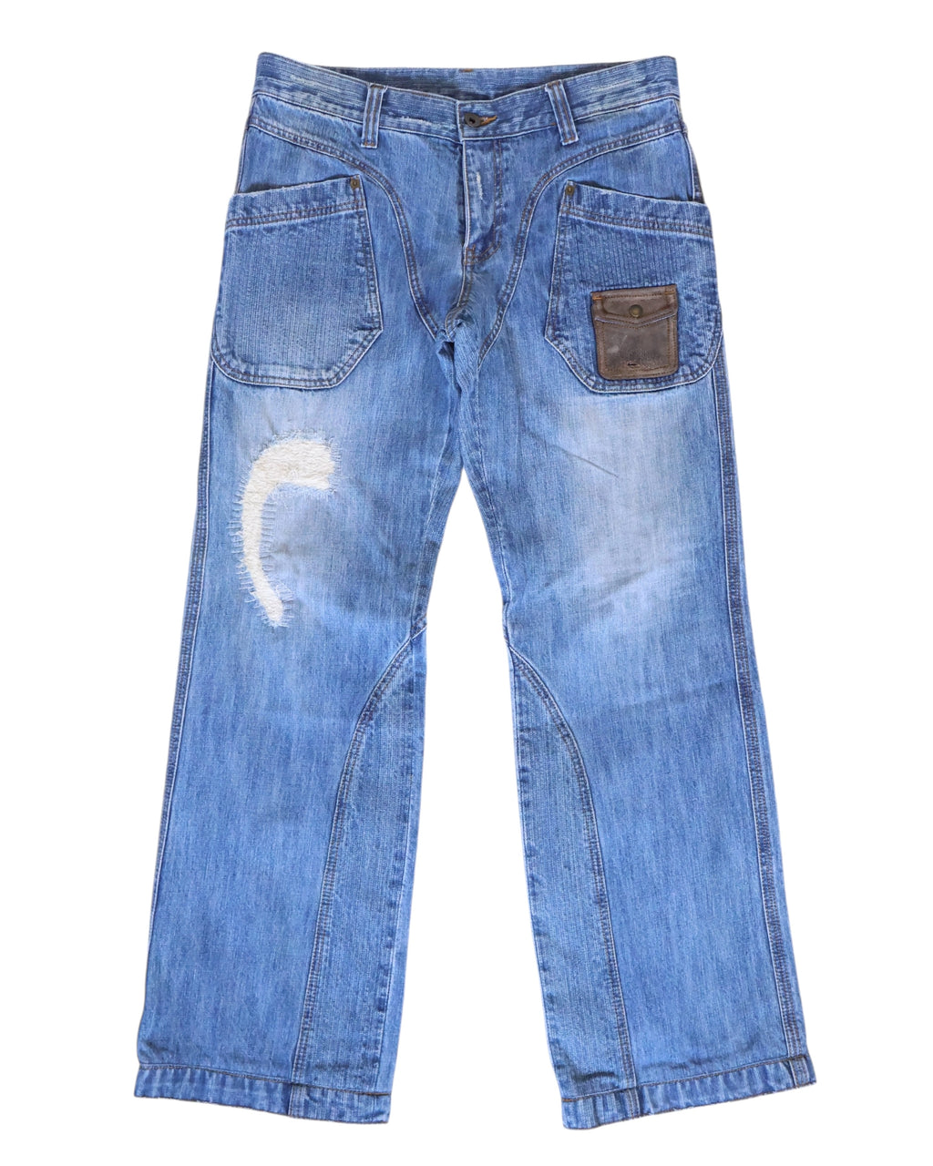Vintage Kenji Ito “Comme ça Collection” light-blue jeans/denim trousers with workwear patch pockets, a small leather snap pocket, curved seam panels and a straight-leg cut; gently faded with whiskering and a crescent distressed repair, mid-rise with belt loops and button fly, laid flat on white—luxury, rare, utility-inspired.