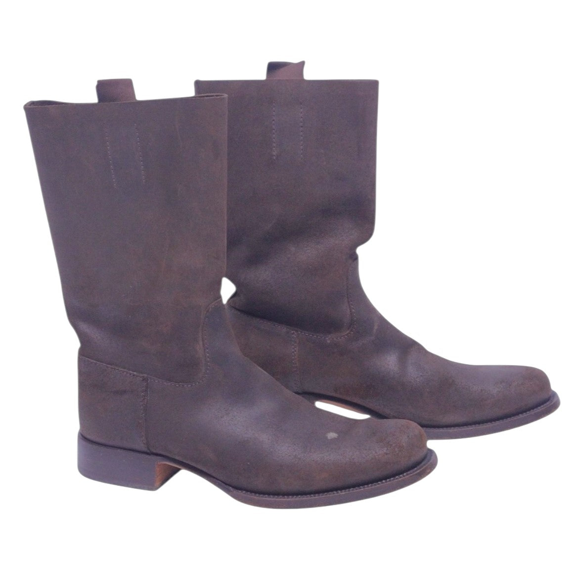 A pair of brown Prada Western boots with a low heel and no visible brand markings. Prada western pull-on boots in matte brown leather, mid-calf height with round toe, pull tabs and a low stacked heel. Clean cowboy silhouette with subtle wear and vintage/luxury appeal.