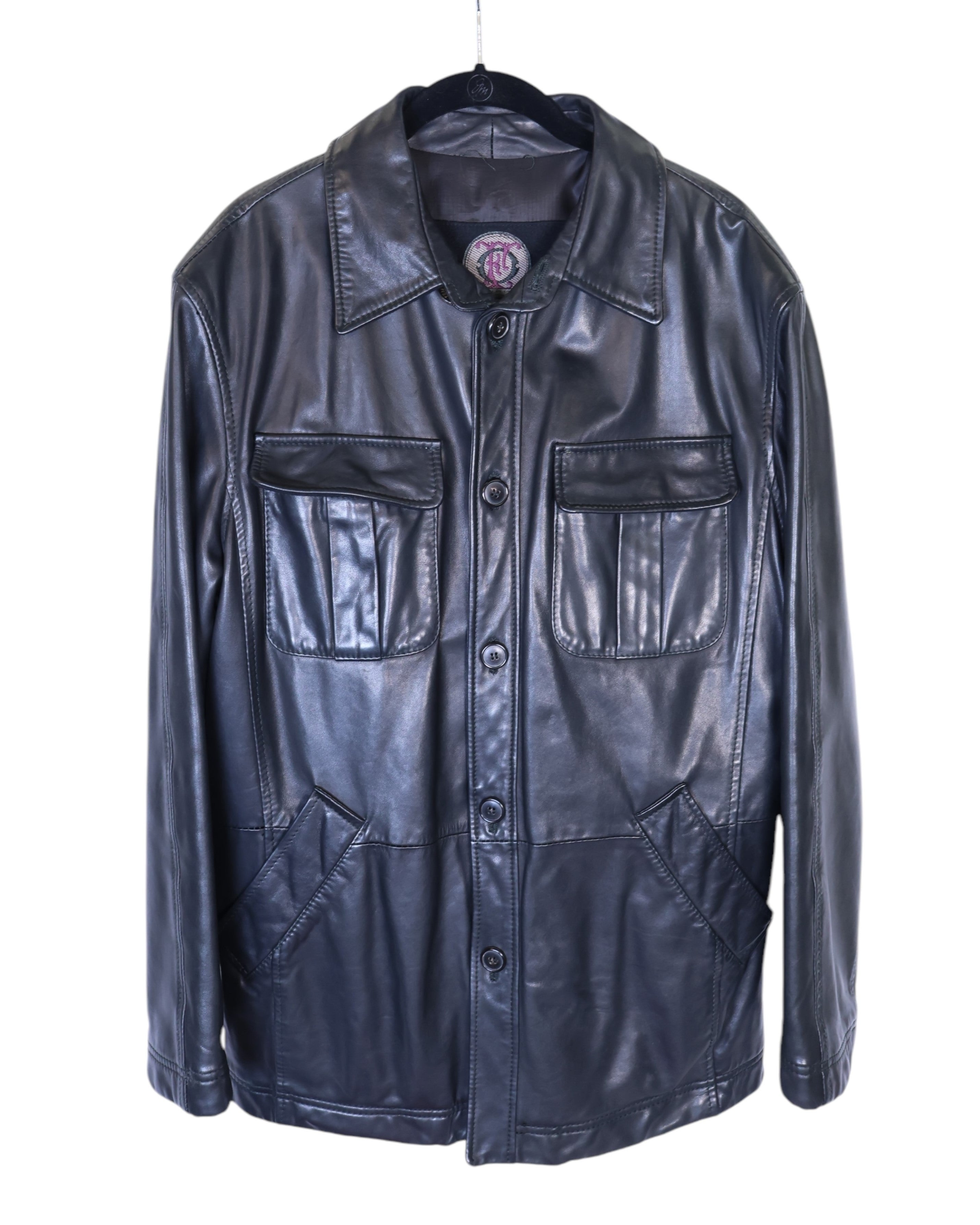 Gianfranco Ferré (Ferre) black calfskin Nappa leather jacket, shirt-jacket/shacket/overshirt style — Italian luxury house from Milan; smooth glossy Nappa, pointed collar, button-front placket, twin flap chest pockets, angled hand pockets, straight hem, tonal stitching; tailored regular fit, lightweight–midweight outerwear; unisex minimalist designer piece, made in Italy, perfect for jeans or tailoring.