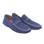 A pair of dark blue leather slip-on shoes with stitching detail on the upper and a rubber sole. Moreschi navy leather loafers with perforated upper, penny strap, moc-toe and bold white contrast stitching, set on a rubber sole; vintage Italian designer, rare.