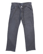 Vintage Dolce & Gabbana dark-gray jeans/denim trousers with a washed finish; mid-rise straight-leg cut, slanted front pockets, belt loops and button front, subtle fading and raw frayed hems. High-end designer piece, rare and unique, laid flat on a white background.