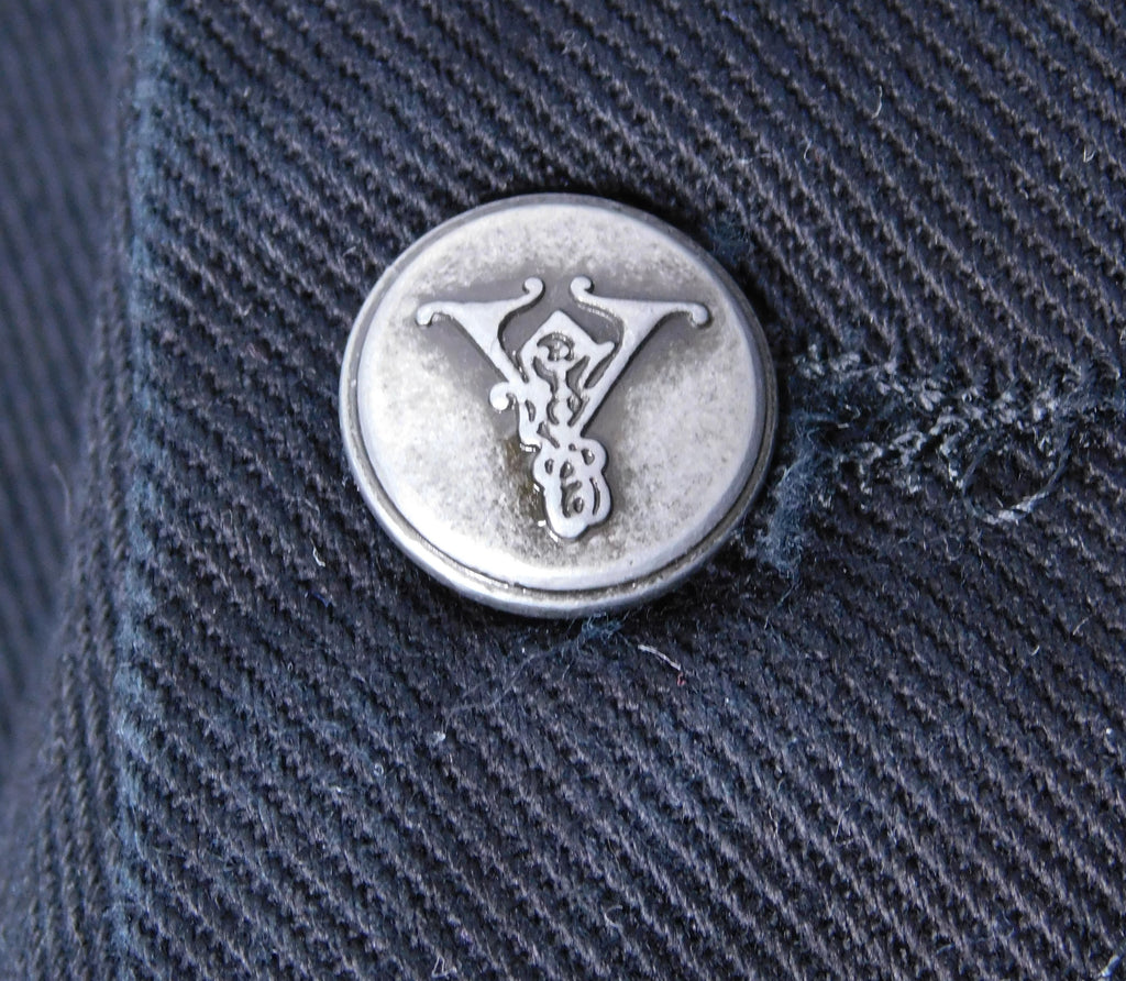 Voyage Mazzilli Michielsens black jeans with shark teeth pendants