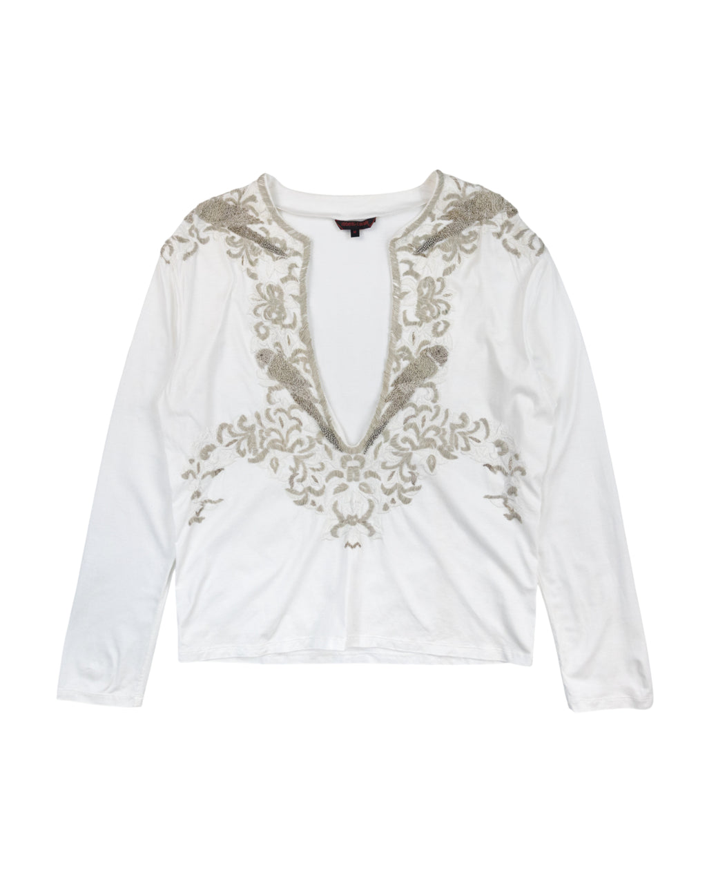 Roberto Cavalli White long-sleeve top with  a deep V-neck and with embroidery on a white background. Roberto Cavalli white/ivory cotton jersey long-sleeve top; dramatic deep V-neck, ornate baroque embroidery in metallic thread, soft drape; slim/regular fit, unisex styling; perfect with denim, tailoring or night-out looks; boho/glam/Y2K/Italian baroque; Italian luxury house known for opulent prints and craftsmanship; rare vintage piece.