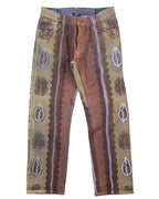 A pair of jeans with a geometric and leaf pattern and pearl beading design. Vintage straight-leg jeans in earthy olive and rust with vertical panel stripes and teardrop/paisley motifs, dotted with pearl-like beading. Classic denim waistband with belt loops and front fly; designer, rare statement pair.