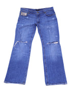 Vintage Roberto Cavalli medium-blue jeans/denim trousers with ripped knees and light fading. Straight-leg five-pocket style featuring a snakeskin-pattern coin pocket; luxury designer, rare and unique, laid flat on white.