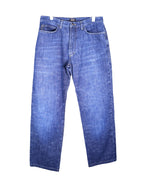 Vintage Gianfranco Ferré medium-blue jeans/denim trousers with a classic washed finish; mid-rise straight-leg, five-packet style with belt loops and button front, gentle fading and clean hems, laid flat on white—heritage luxury and rare.