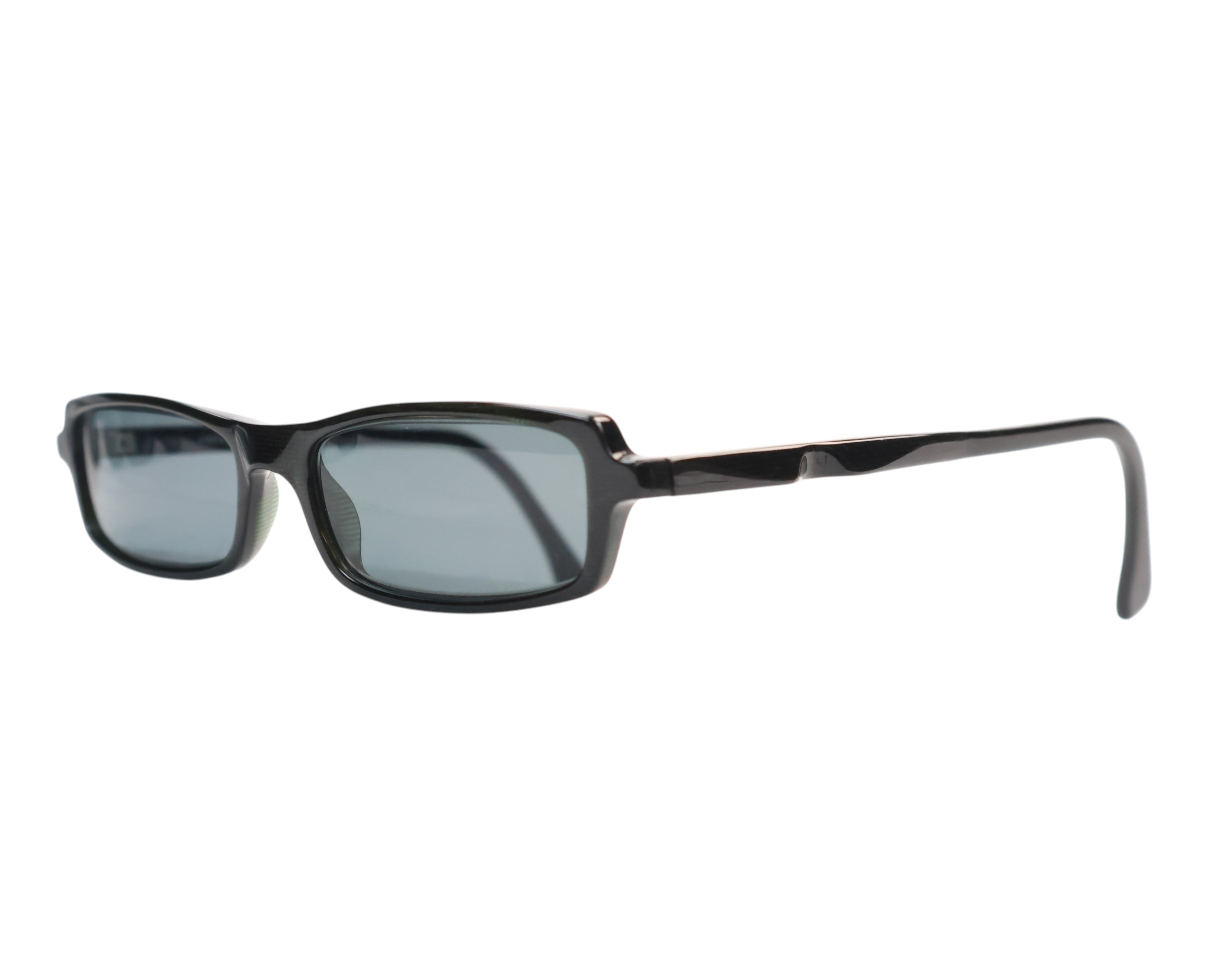 Alain Mikli Paris designer sunglasses / shades / eyewear — slim narrow rectangular silhouette, glossy black acetate frame with a subtle wrap profile; smoke-grey lenses; sculpted temples for a clean, minimalist look; lightweight, unisex fit. Brand context: Alain Mikli is a Paris-born French-Lebanese eyewear house (est. 1978) renowned for avant-garde, hand-crafted acetates and architectural shapes, with many frames made in France/Italy — collectible luxury eyewear for men or women.