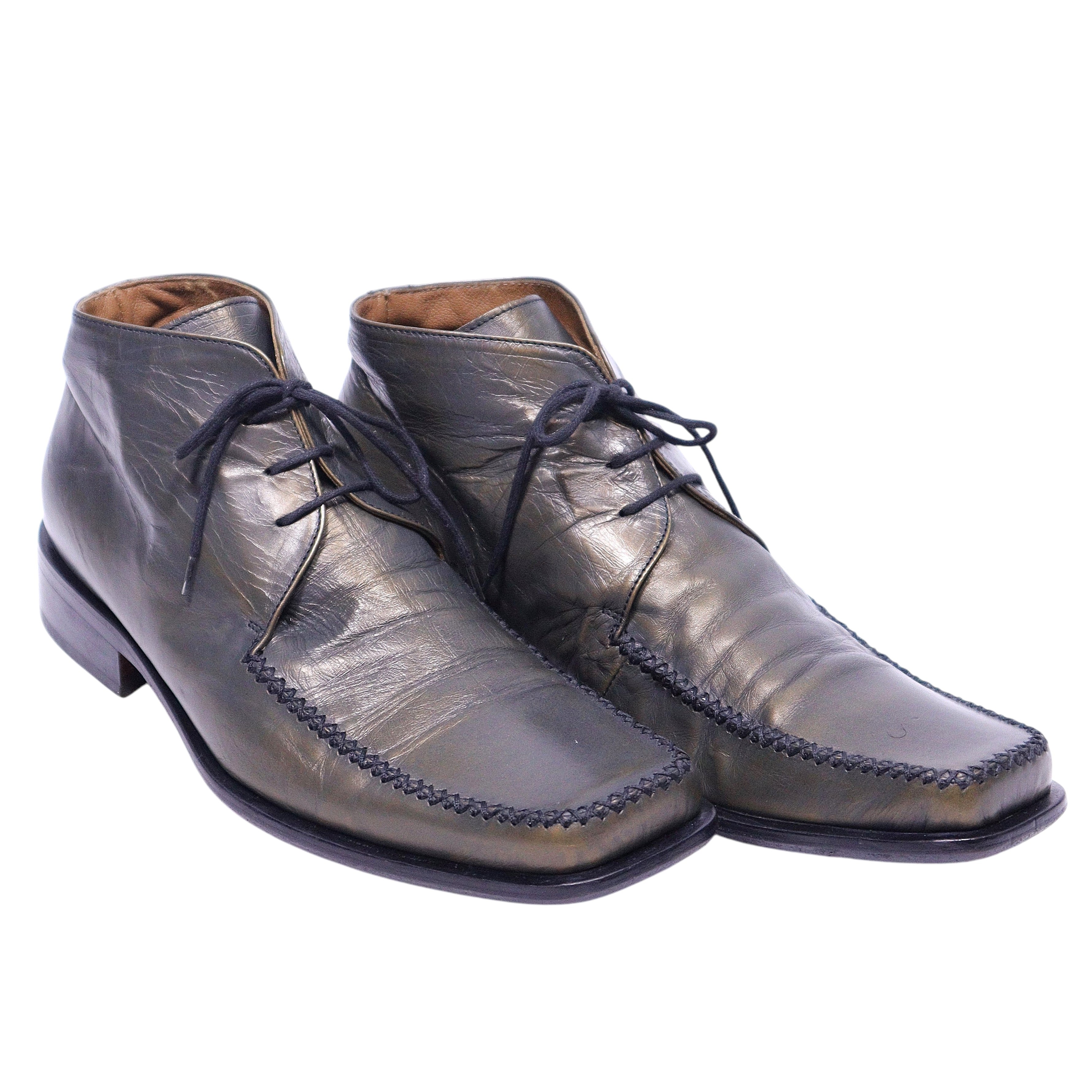 A pair of olive-brown leather shoes with a lace-up closure, made by Roberto Cavalli. Roberto Cavalli olive-brown leather lace-up ankle shoes with a square apron toe, hand-stitched moc detail and a low stacked heel; sleek Italian designer pair with subtle vintage patina.
