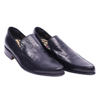 A pair of black leather loafers with a visible textured sole. Roberto Cavalli black leather loafers with squared toe, slip-on design, logo stud, and low stacked heel.