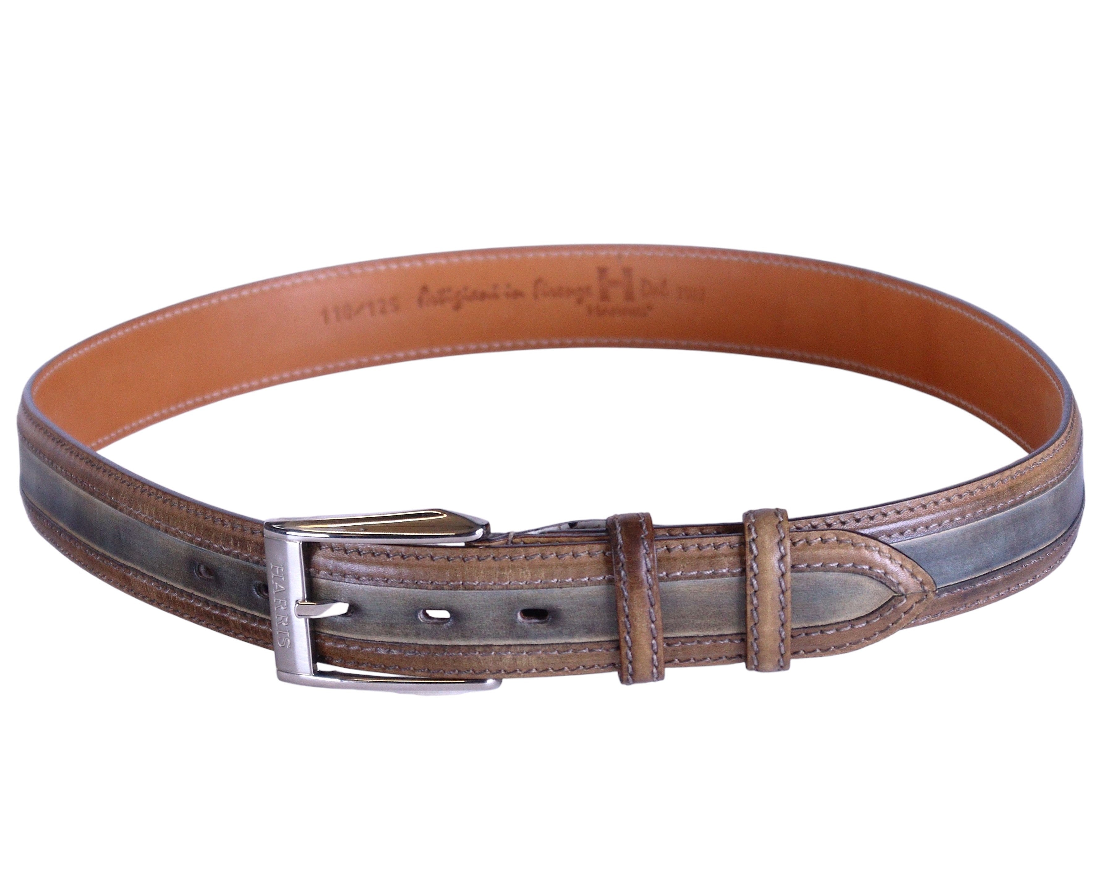 A brown genuine leather belt made in Florence, Italy, with a metal buckle. Alt: Harris Firenze Italian artisan leather belt—hand-dyed full-grain strap with aged brown/olive gradient patina, contrast top-stitching, double keepers and polished silver-tone prong buckle; made in Florence, Tuscany by traditional craftsmen; rugged yet refined, vintage designer accessory; adjustable unisex waist belt for jeans, chinos or tailoring; durable, collectible, luxury Italian leather goods.