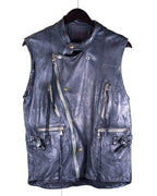 zippered front, and multiple pockets. Christian Peau black leather moto vest / biker gilet / sleeveless jacket / waistcoat—hand-dyed, distressed patina, asymmetrical zip front, snap stand collar, diamond-stitched shoulders, multiple zip pockets, buckle straps and hardware, artisan construction, vintage workwear meets avant-garde. Japanese label from Kyoto known for small-batch leather craftsmanship and old-world techniques; unisex styling for layering over tees, shirts, or knits.