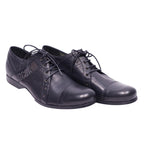A pair of black Just Cavalli leather oxford shoes with lace-up closure. Just Cavalli black leather Oxford shoes with cap toe, lace-up closure, side logo panel, subtle stud accents, and low-profile sole.