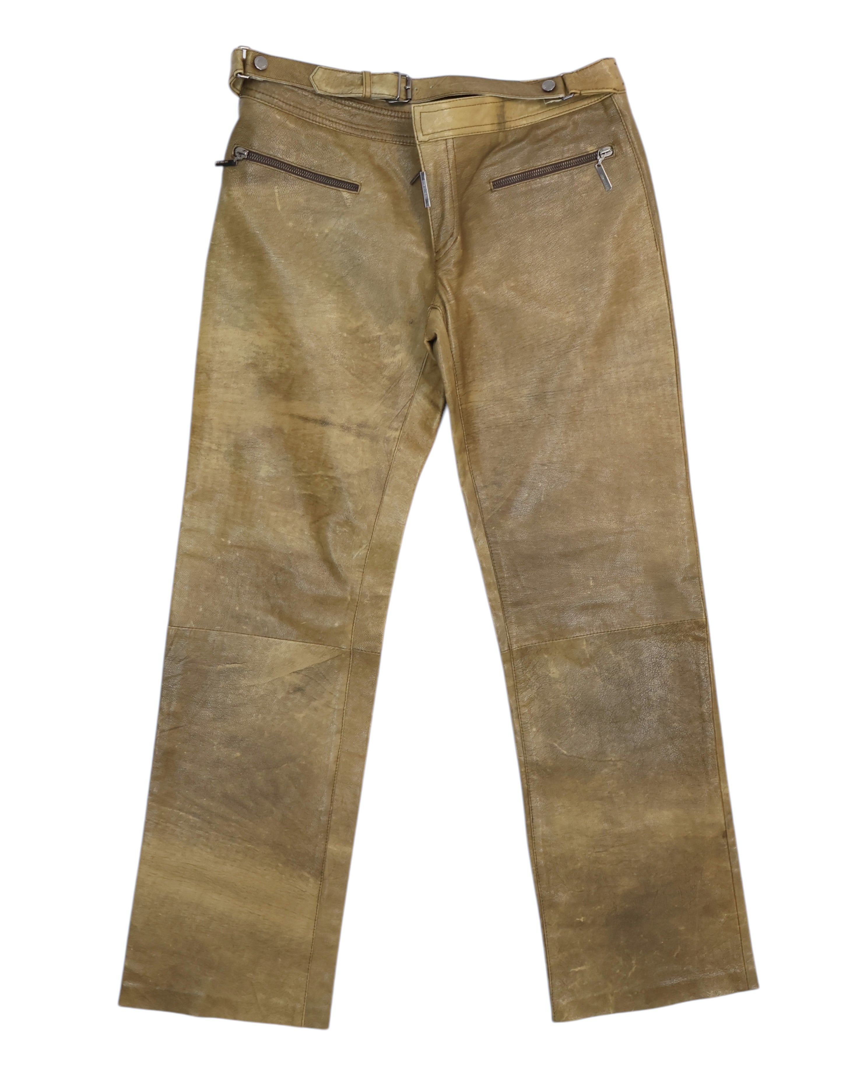 A pair of brown Roberto Cavalli leather pants with belt, displayed against a white background. Vintage Roberto Cavalli olive-brown leather trousers with adjustable belt tabs at the waist, twin angled zip pockets and straight legs; smooth, lightly worn finish—luxury, rare designer piece laid flat on white.