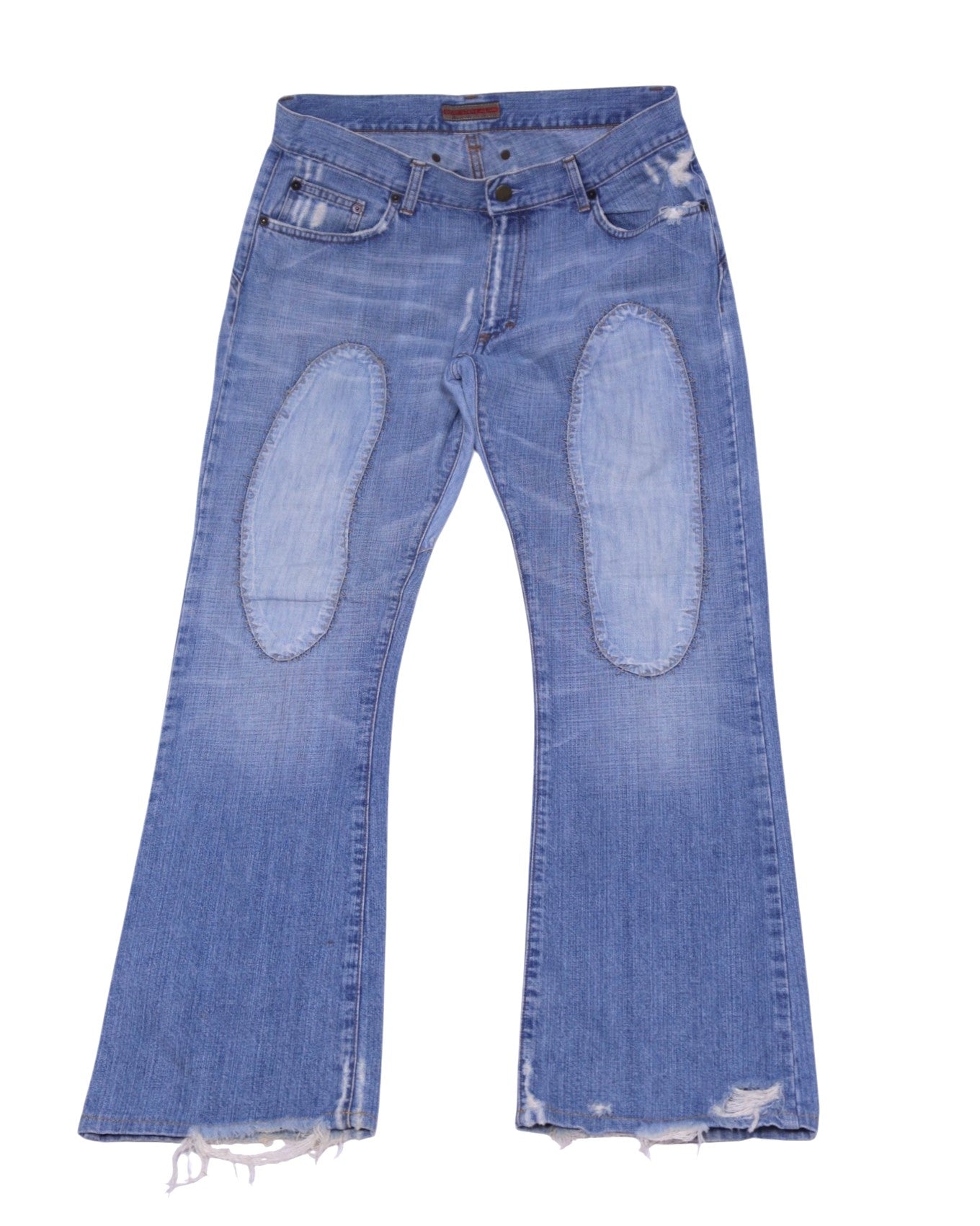 Vintage Bray Steve Alan blue denim jeans/jean trousers in a medium faded wash, mid-rise bootcut/flare silhouette with whiskering, oval knee patches, five-pocket design and button front; distressed raw/frayed hems for a worn-in look. Luxury designer piece, rare and unique, laid flat on white.