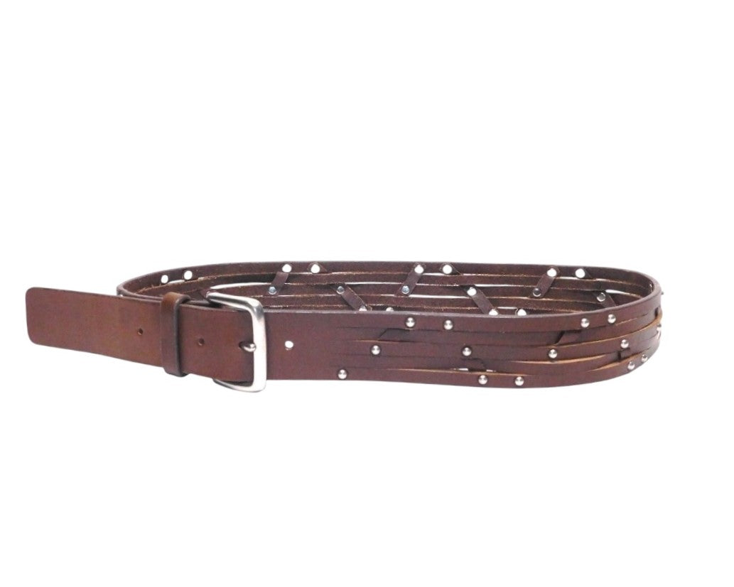 A brown leather belt with studded rivets and a metal buckle, displayed on a plain background. Vintage Yohji Yamamoto brown leather belt; Japanese avant-garde designer from Tokyo; slim/skinny layered wrap straps; silver-tone studded rivets; polished metal prong buckle; adjustable multi-hole fit; unisex styling for men or women; luxury artisan cowhide; rare limited piece; runway/punk/grunge/minimal vibe; perfect for jeans, trousers, or tailoring; premium Japanese craftsmanship