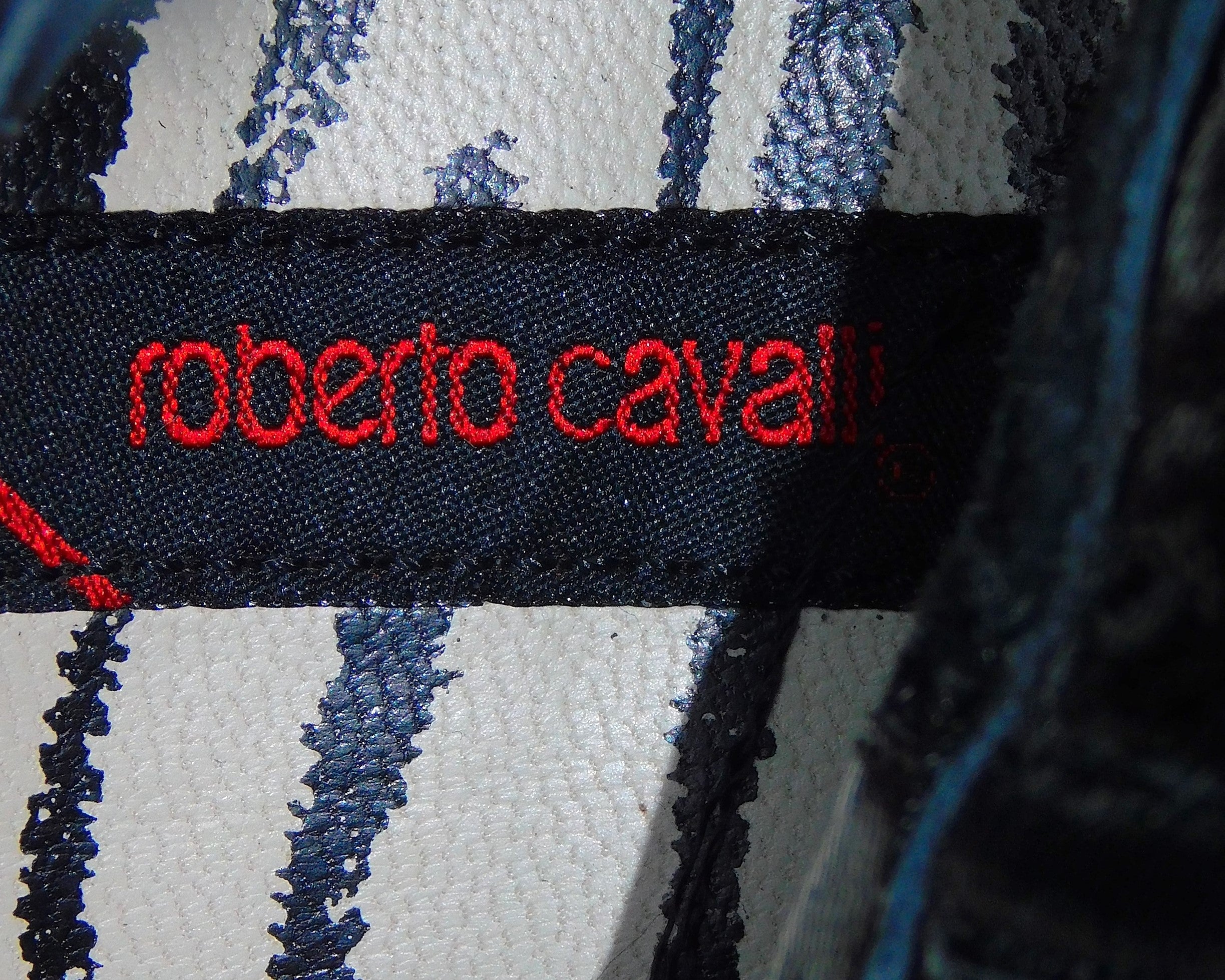 Roberto Cavalli black leather glossy finish santiag boots with embossed leather desing