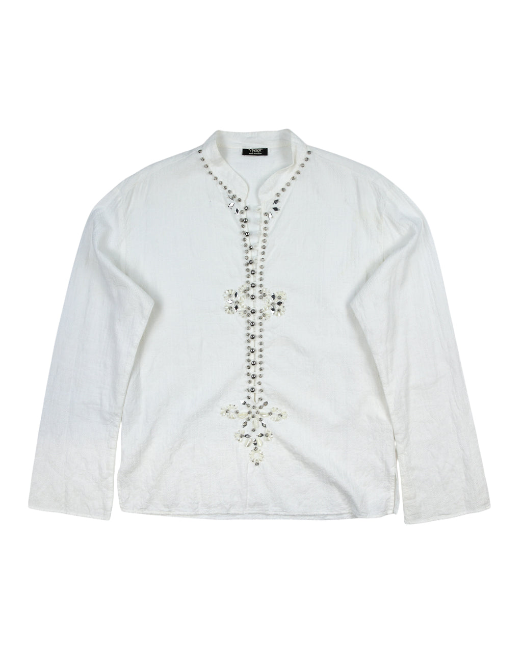 Voyage Mazzilli & Michielsens white/ivory long-sleeve shirt; band collar with notched V, textured cotton/linen feel; hand-embellished beaded/crystal floral placket in a vertical motif; relaxed easy fit, unisex; style with jeans, tailoring, leather; tags: boho, rock, festival, Y2K, romantic; Voyage (Europe, boutique studio craft, small-batch), collectible.