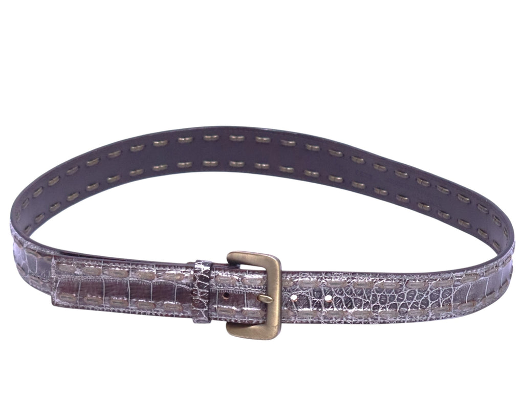 A brown leather belt with a crocodile texture and a brass buckle, from the Kenji Ito Comme ca collection. Kenji Ito Comme Ça Collection brown leather belt, crocodile-embossed / croc-effect / reptile texture; slim waist strap with single keeper; antique brass buckle and hardware; unisex fit; great with jeans, tailoring or dresses; style tags: sleek, minimalist, smart casual, streetwear; Japanese design heritage, quality craft, rare vintage.