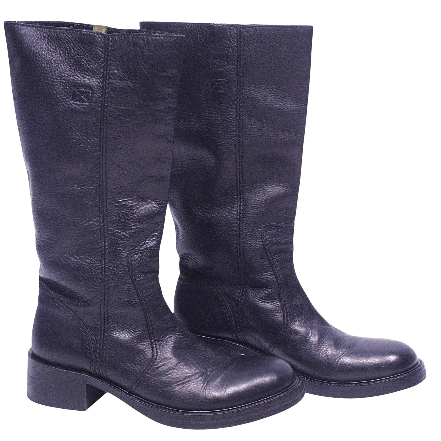 A pair of black tall leather boots with a low heel and no visible brand marking. Roberto Cavalli black tall leather boots with round toe, pull-on shaft, subtle logo stamp, and sturdy block heel.