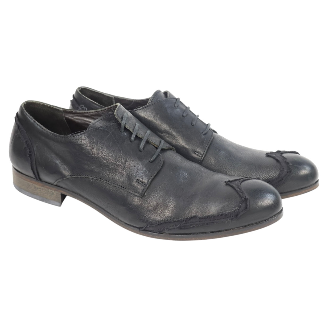 Collection PRIVÉE? black leather derby shoes with open lacing, raw-edge overlays, tonal stitching and a low stacked heel; gently distressed, artisanal finish. Vintage, luxury dress shoes—rare, unique Italian lace-ups.