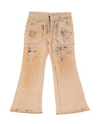Vintage Just Cavalli beige/tan jeans/trousers in cotton denim with scratch-print, scuffed black marks and distressed finish; mid-rise five-pocket bootcut/flare with belt loops and stitched hems, luxury designer and rare, laid flat on white.