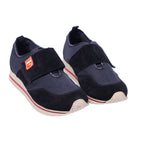 A pair of Gianfranco Ferre Sport shoes with navy upper material, white sole, and red detailing. Gianfranco Ferré Sport navy sneakers with mesh knit uppers, suede overlays and a wide Velcro strap, rounded toe and textured rubber sole with red stripe. Sleek sport-casual trainer; vintage designer, rare.