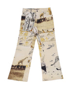 A pair of Roberto Cavalli African hunting cheetah print pants, featuring a beige background with animal prints. Vintage Roberto Cavalli safari-print jeans in cream with illustrated wildlife panels—giraffes, big cats, birds and botanicals—like a sketchbook collage. Mid-rise straight/bootcut five-pocket denim with button fly and belt loops; luxury, rare, laid flat on white.