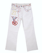 White jeans with colorful stone embroidery, including floral patterns and numbers. Vintage white denim jeans with multicolor stone and bead embroidery across the waistband and front, featuring a “21” and floral initial motif. Straight-leg, five-pocket style with belt loops and front fly; rare designer piece.