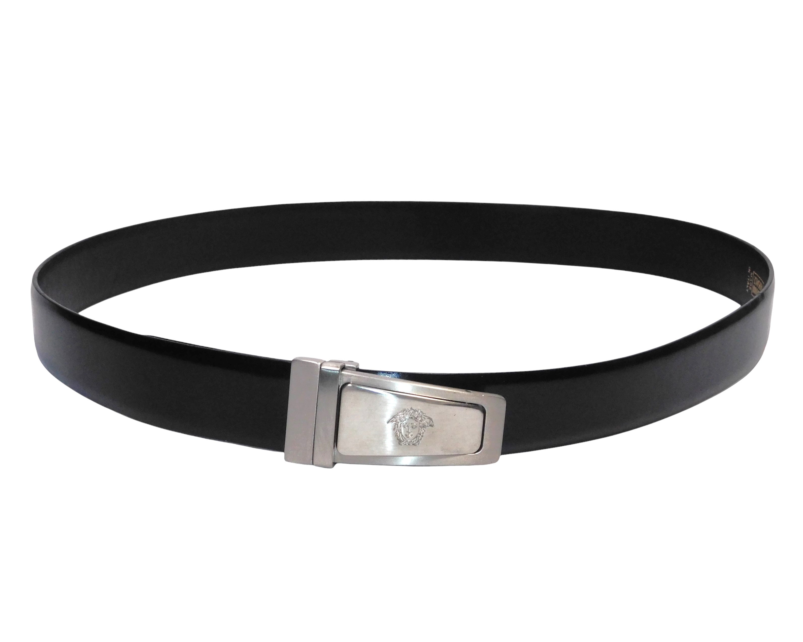 Gianni Versace black/jet-black calfskin leather belt; polished silver-tone logo clasp buckle with engraved Medusa; sleek narrow strap, unisex fit; ideal with jeans, dress trousers, or tailoring; style tags: classic, minimal, 90s/Y2K, luxury Italian glam; brand context: Italian heritage luxury house from Milan; rare vintage accessory.