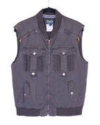 Dolce & Gabbana (D&G) 2003 utility vest / gilet / sleeveless jacket in charcoal grey—zip-front, ribbed bomber collar and hem, snap-flap cargo pockets, mesh pocket panels, chest zip pockets, technical nylon-cotton twill, sport/techwear and workwear vibe, Y2K street style layering piece. Italian luxury label known for Milan fashion heritage and sharp tailoring; unisex layer over tees, hoodies or shirts.