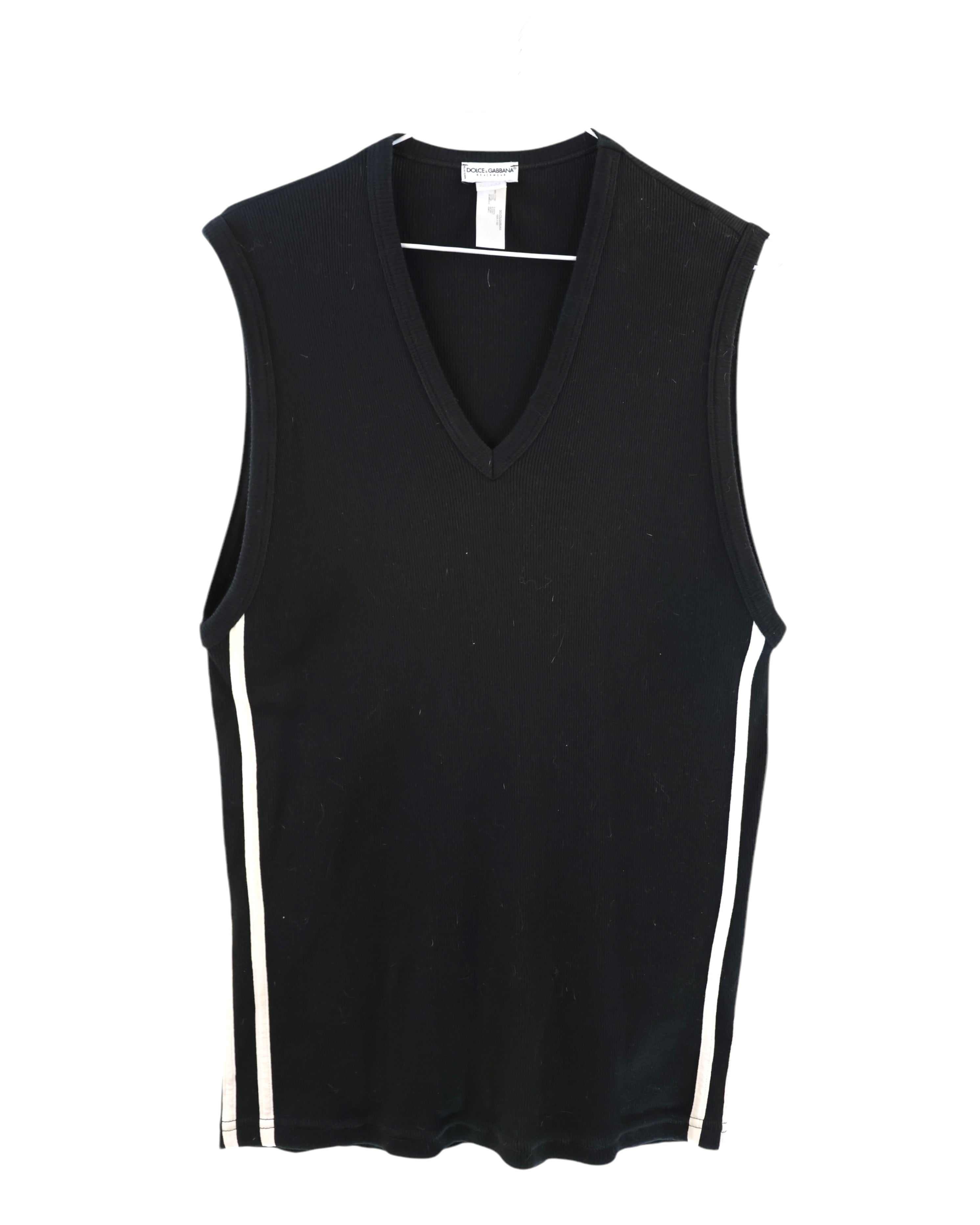 Dolce & Gabbana vintage black tank top / sleeveless V-neck vest—ribbed knit cotton jersey with contrast white racing stripes down the sides; minimalist, logo-free Italian designer piece from Milan; luxury craftsmanship and tailoring heritage; unisex muscle tee/singlet/jersey, slim fit layering essential with Y2K/’90s athleisure streetwear vibe.