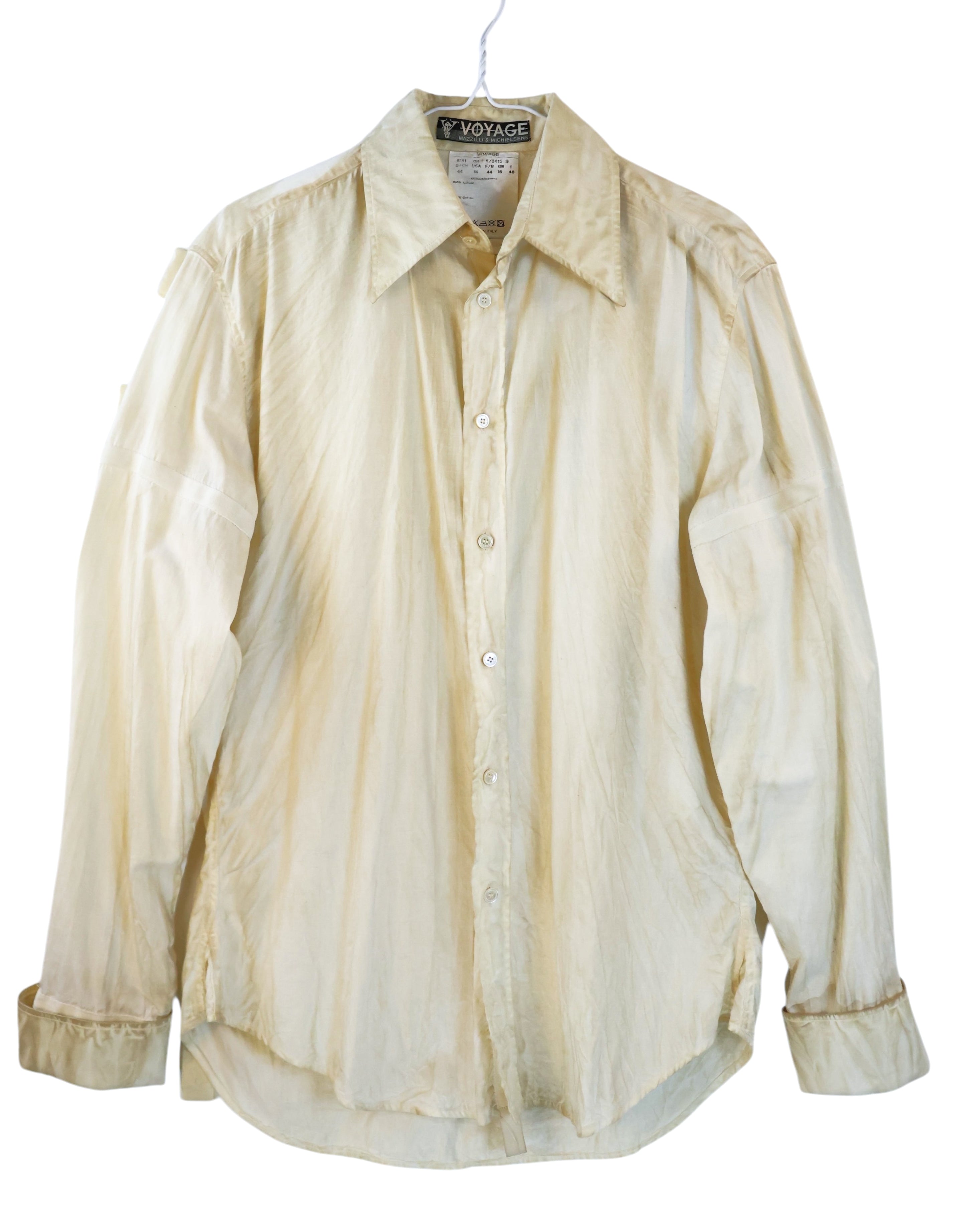 Vintage Voyage by Tiziano Mazzilli & Louise Michielsens cream/ivory dress shirt — European cult label, boutique artisanal craftsmanship; lightweight silky/crinkle texture, pointed collar, button-front, long sleeves, relaxed drape, minimalist/boho/avant-garde designer top, unisex, collectible and rare.