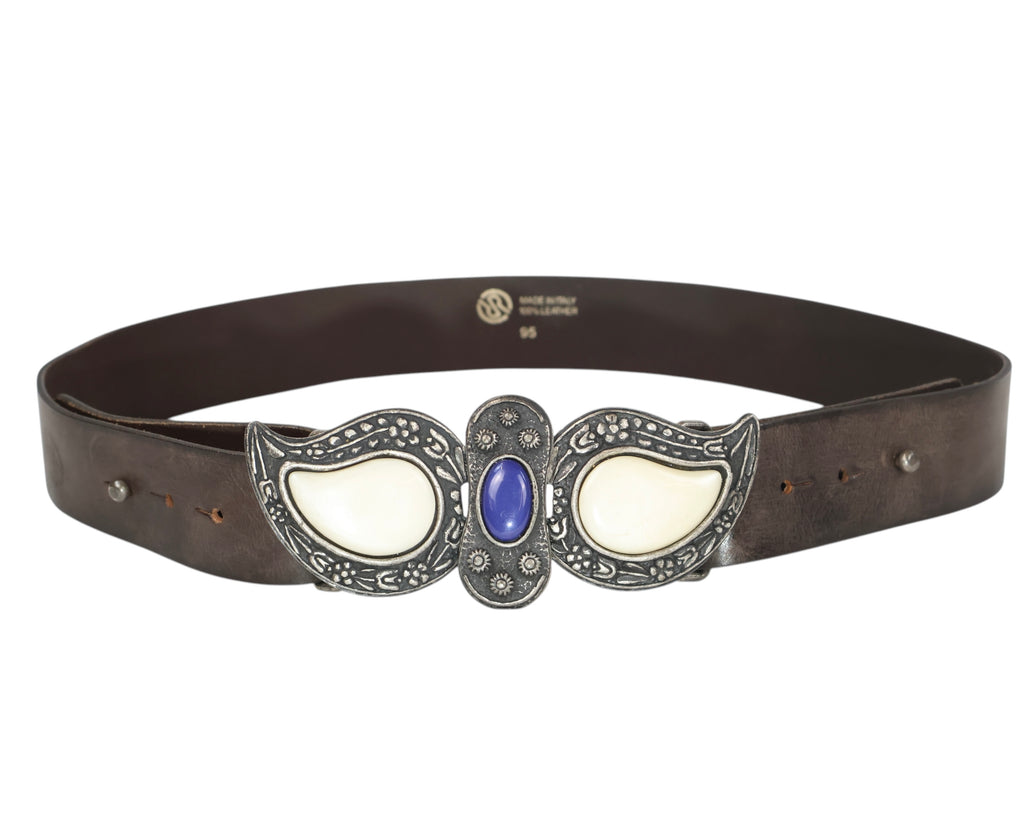 A brown leather belt with a paisley-shaped stone buckle featuring silver and blue colors. Roberto Cavalli dark brown leather belt / waist strap; ornate silver-tone buckle in paisley shapes with cream stone inlays and a central blue cabochon; engraved floral detailing; unisex; great with jeans, tailoring or boho fits; style tags: western, rock, Y2K, statement; Italian luxury house from Florence, artisanal craft; rare vintage.